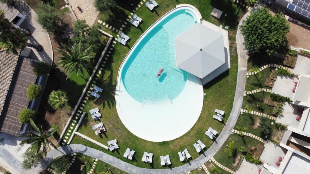 an overhead view of a swimming pool in a resort at Cambiocavallo Resort in Zimmardo