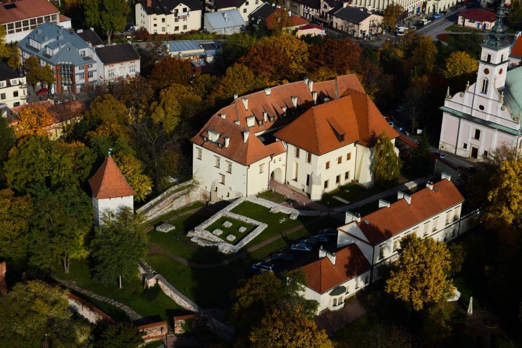 an aerial view of a large house with red roof at Apartament Centrum in Wieliczka