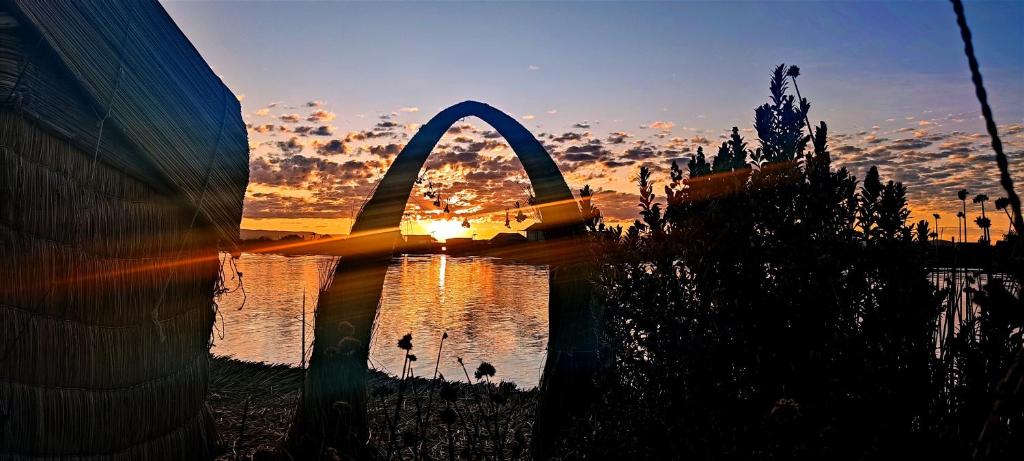 a view of the gateway arch at sunset at Los Uros Lago Titicaca in Puno