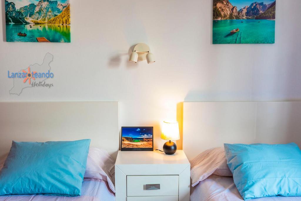 Postel nebo postele na pokoji v ubytování Vivienda Vacacional Casa Ciara