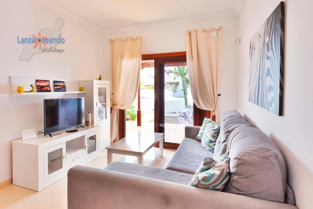 TV a/nebo společenská místnost v ubytování Vivienda Vacacional Casa Ciara