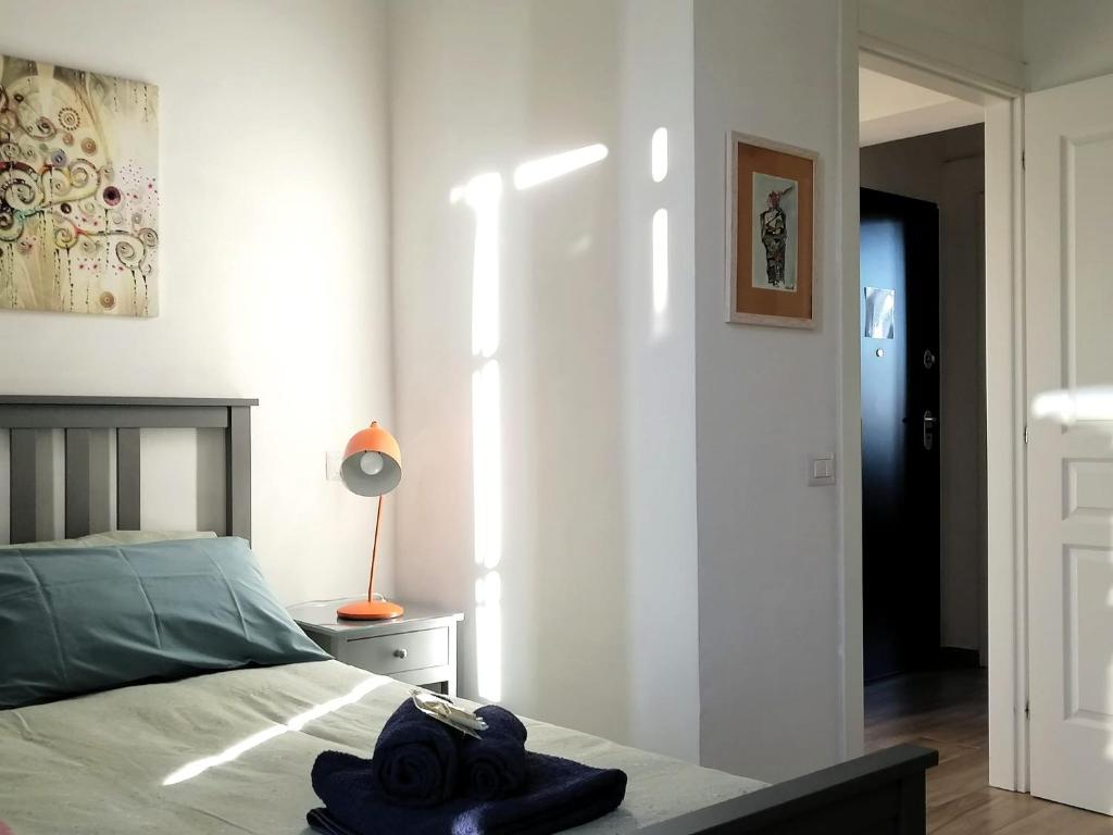 Llit o llits en una habitació de Casa Sansevera Lucca