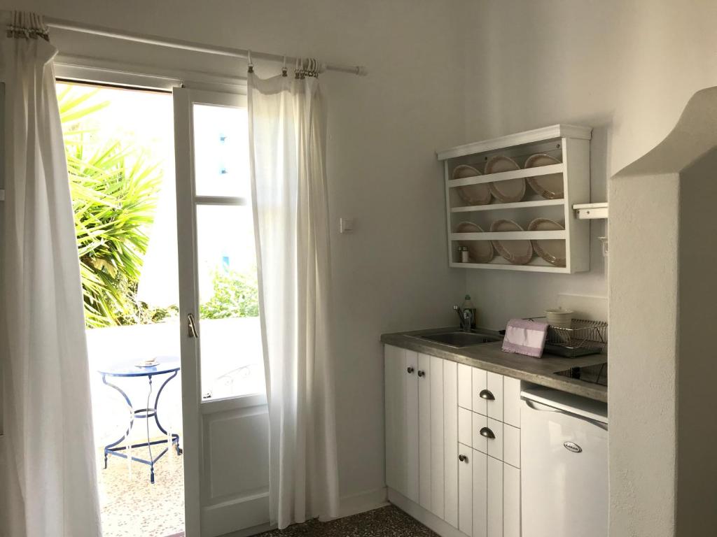 Kuchyň nebo kuchyňský kout v ubytování Bungalows Svoronos