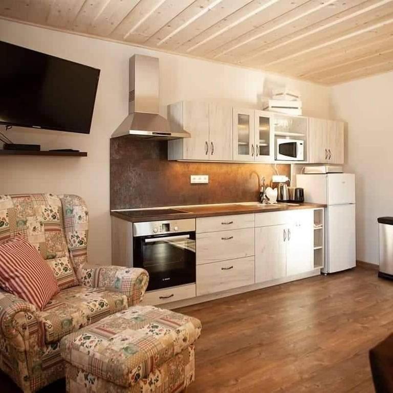 Kuchyň nebo kuchyňský kout v ubytování Apartmány Fišerka