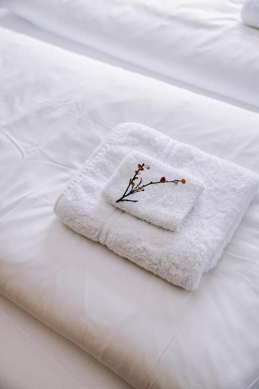 Postel nebo postele na pokoji v ubytování Eldá Guesthouse