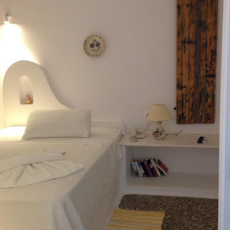 Postel nebo postele na pokoji v ubytování Bungalows Svoronos