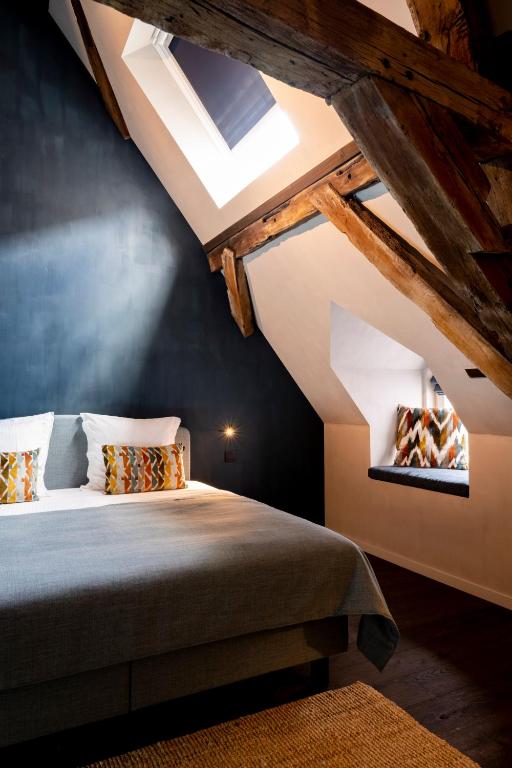 Voodi või voodid majutusasutuse B&B l'histoire de l'éclair toas