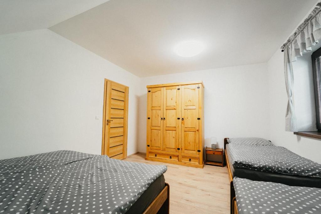 Postel nebo postele na pokoji v ubytování Apartmán Na Palouku Povrly