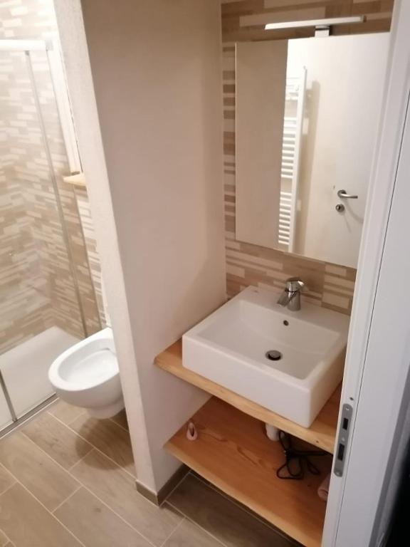 Koupelna v ubytování Pila vacanze
