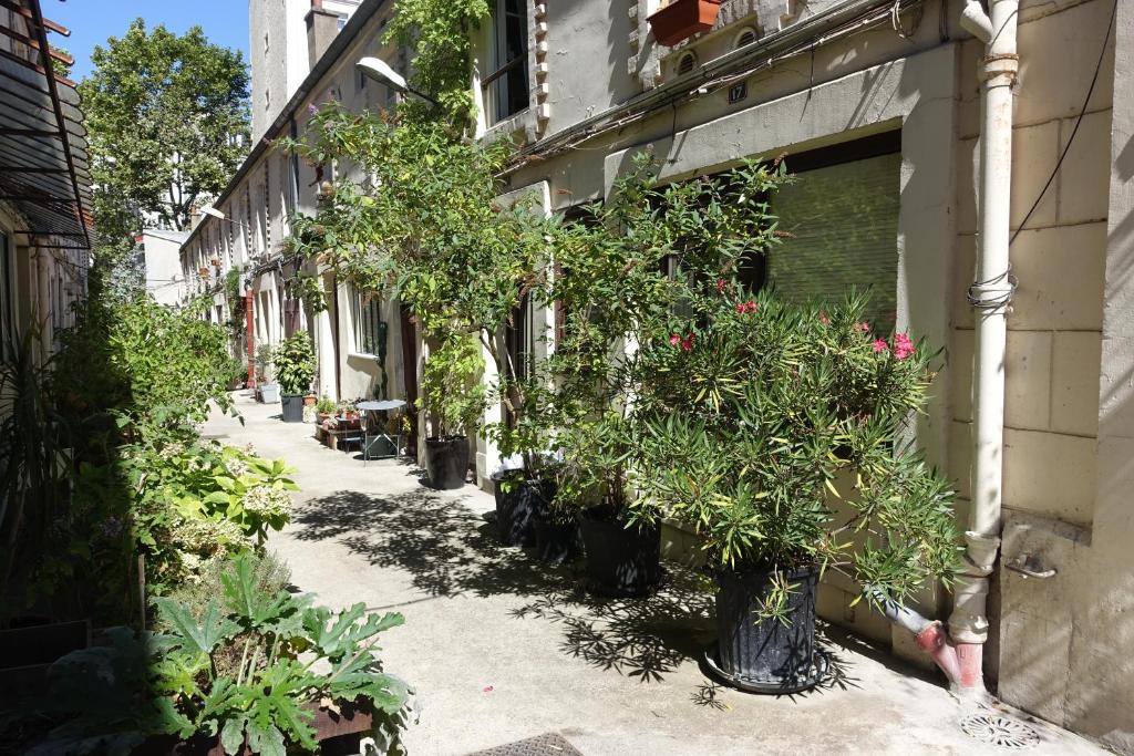 Vonkajšia záhrada v ubytovaní Cité Pilleux - Cozy Apartment in a private lane