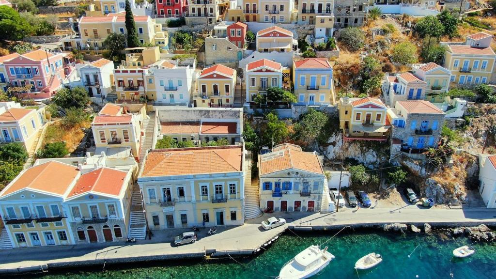 an aerial view of a city with houses at Pitini Sevasti house in Symi