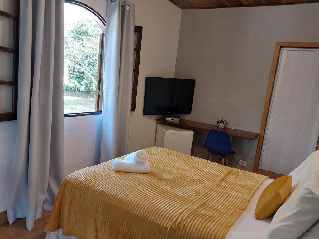 Postel nebo postele na pokoji v ubytování Pousada Schueng