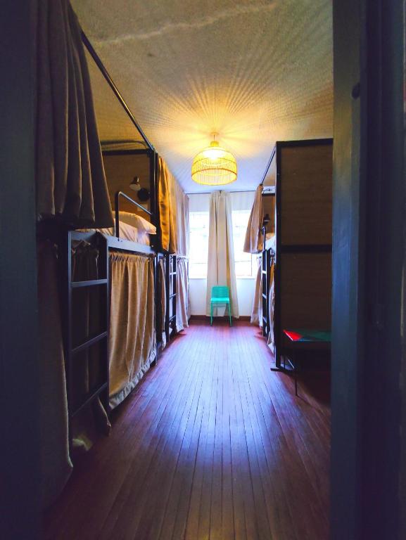 Postel nebo postele na pokoji v ubytování Trip Monkey Chapinero
