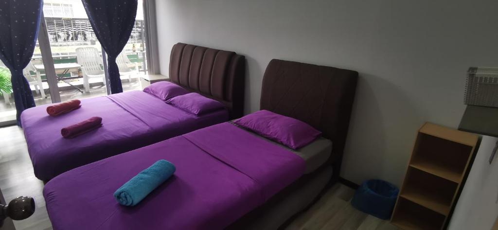 Postel nebo postele na pokoji v ubytování Zero Gravity Homestay 零重力民宿