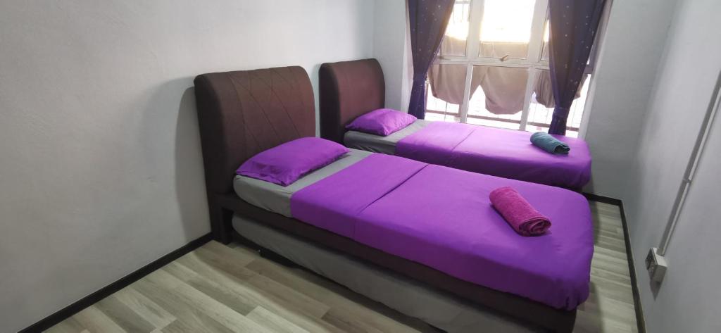 Postel nebo postele na pokoji v ubytování Zero Gravity Homestay 零重力民宿
