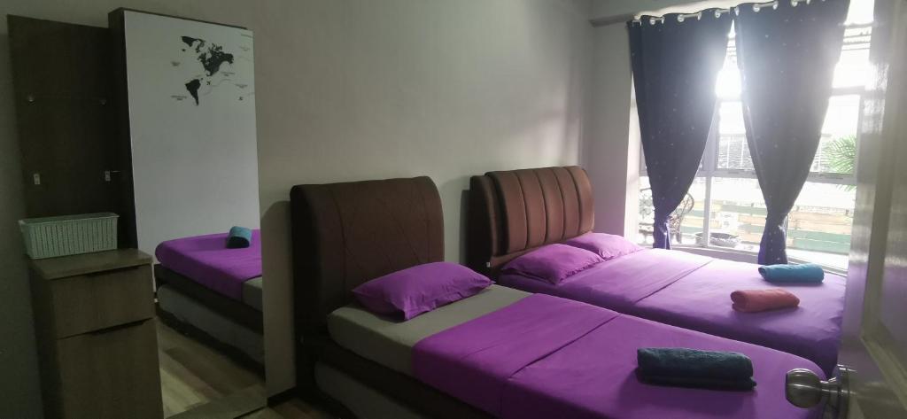 Postel nebo postele na pokoji v ubytování Zero Gravity Homestay 零重力民宿