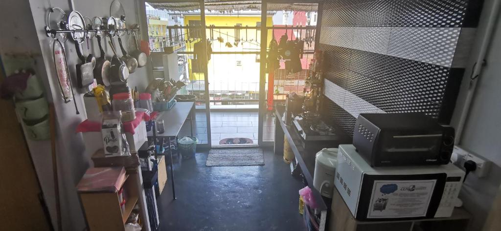 Kuchyň nebo kuchyňský kout v ubytování Zero Gravity Homestay 零重力民宿
