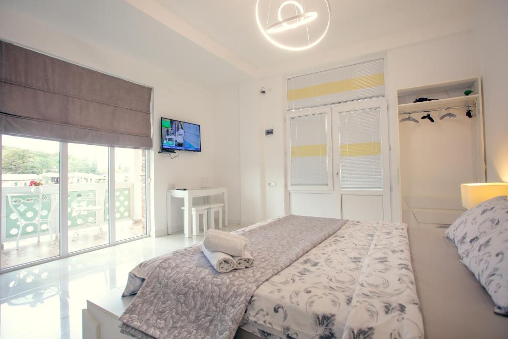 Postel nebo postele na pokoji v ubytování Hotel Paradise Road