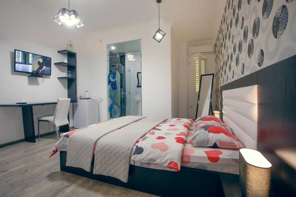 Postel nebo postele na pokoji v ubytování Hotel Paradise Road