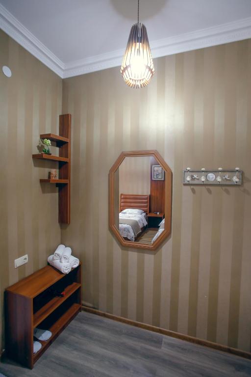 Postel nebo postele na pokoji v ubytování Hotel Paradise Road