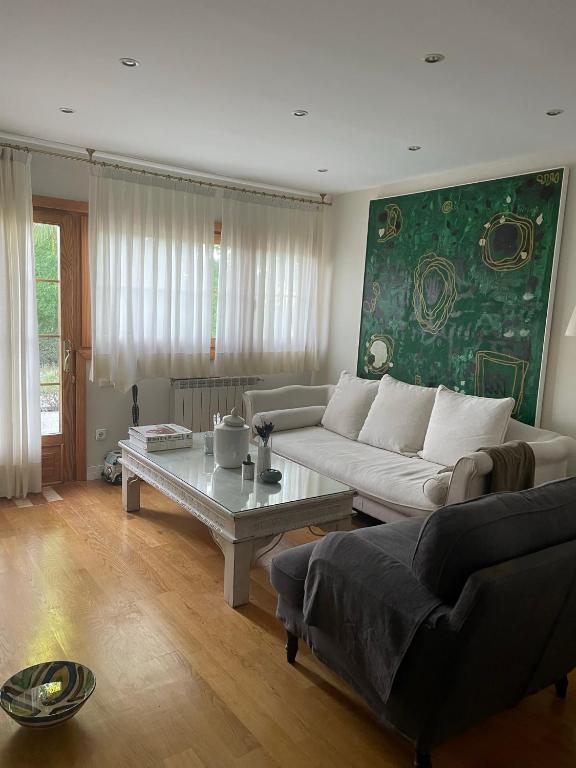 A seating area at Espléndido dormitorio en Suite