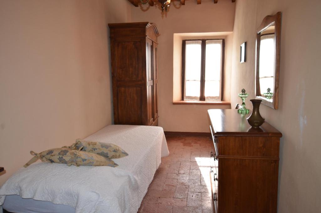 Posteľ alebo postele v izbe v ubytovaní Wonderful villa in Montepulciano