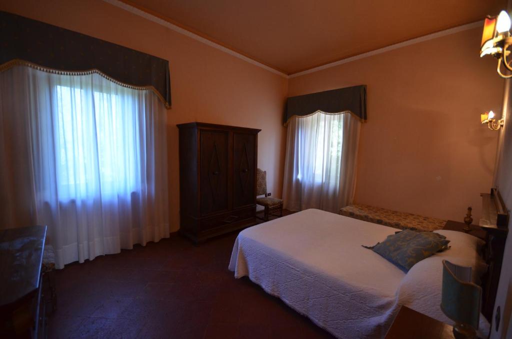 Posteľ alebo postele v izbe v ubytovaní Wonderful villa in Montepulciano