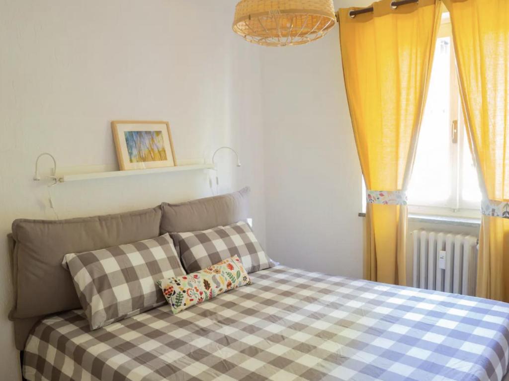 Postel nebo postele na pokoji v ubytování Lovely Flat in Morgex