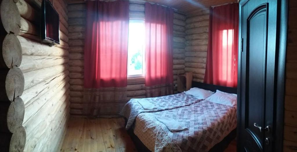 Postel nebo postele na pokoji v ubytování Guest house Ozernaya