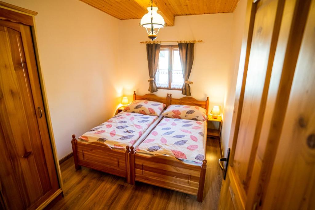 Postel nebo postele na pokoji v ubytování Chata Mária & Apartmány Mária