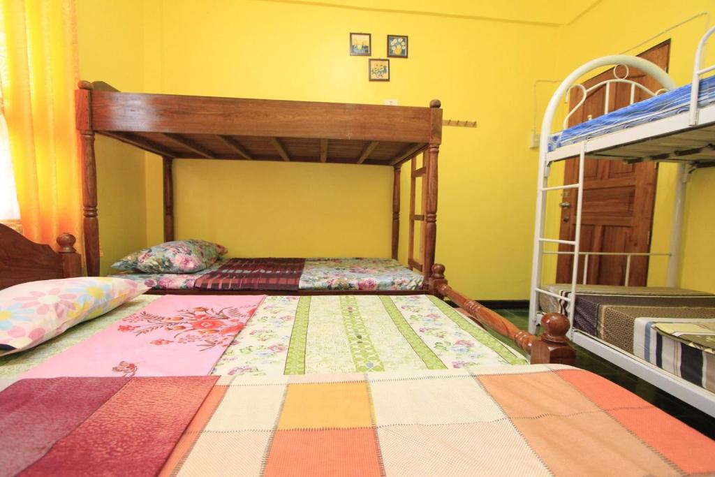 Postel nebo postele na pokoji v ubytování Joval Homestay