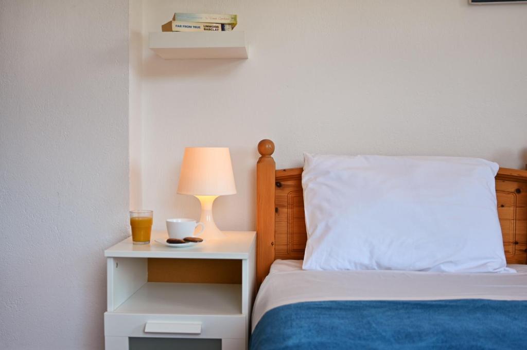 Postel nebo postele na pokoji v ubytování Villa Daisy Fiskardo