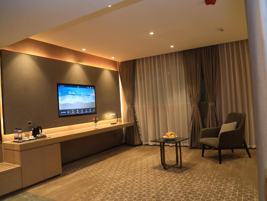 TV a/nebo společenská místnost v ubytování Skylight In-Terminal Hotel