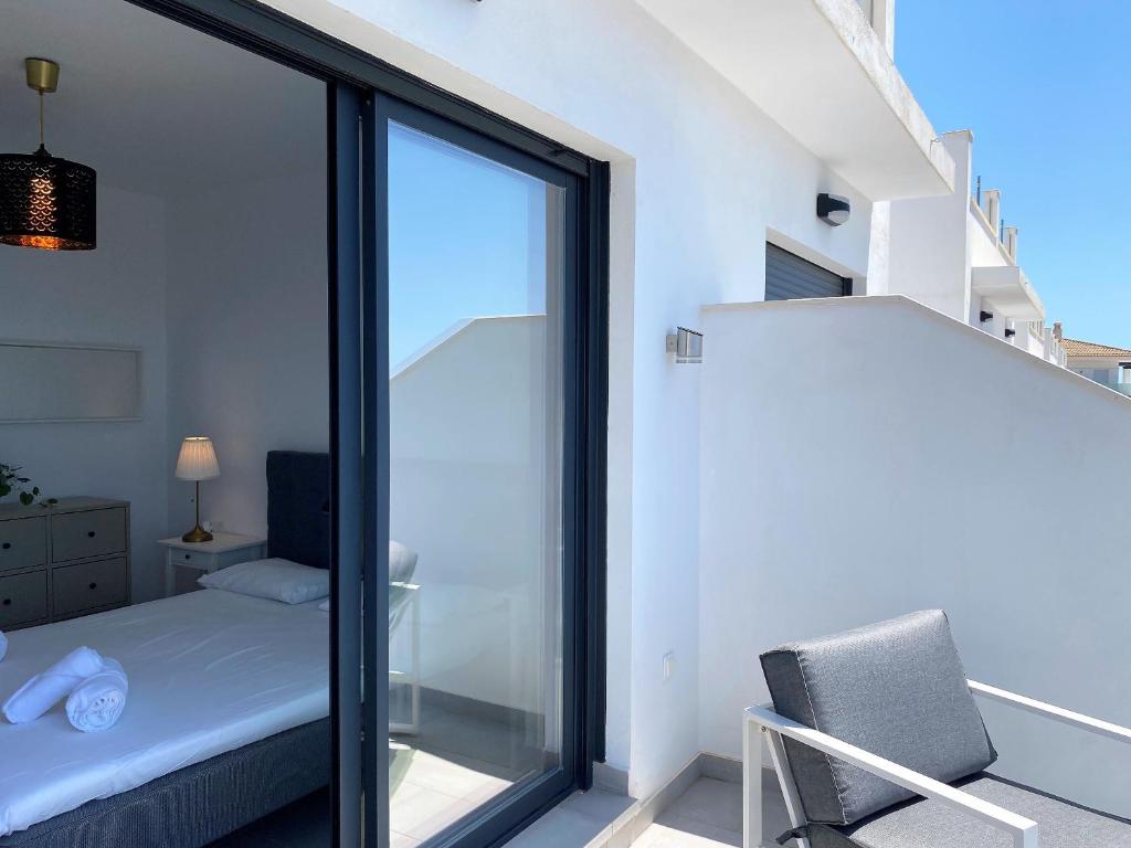 Posteľ alebo postele v izbe v ubytovaní Terrazas de Ladera Duplex 2 Casasol