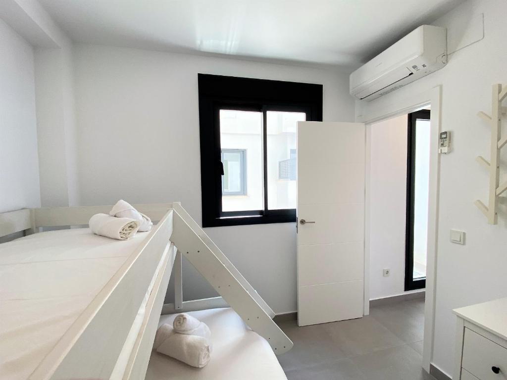 Posteľ alebo postele v izbe v ubytovaní Terrazas de Ladera Duplex 2 Casasol