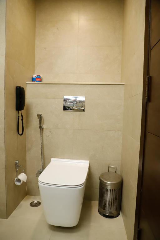 Koupelna v ubytování Udman Hotel Chhattarpur