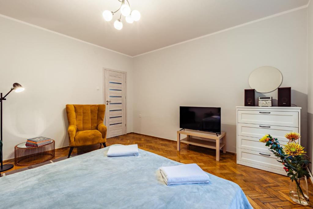 Televízia a/alebo spoločenská miestnosť v ubytovaní Beach House Escape