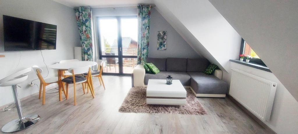 Posedenie v ubytovaní Apartament z widokiem.