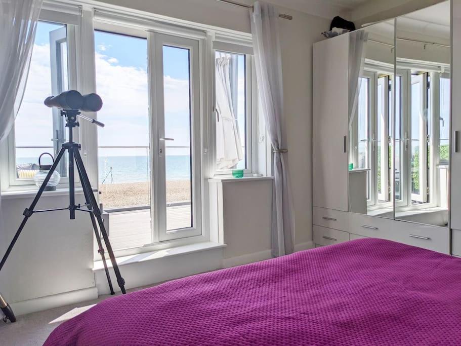 Postel nebo postele na pokoji v ubytování Beach View