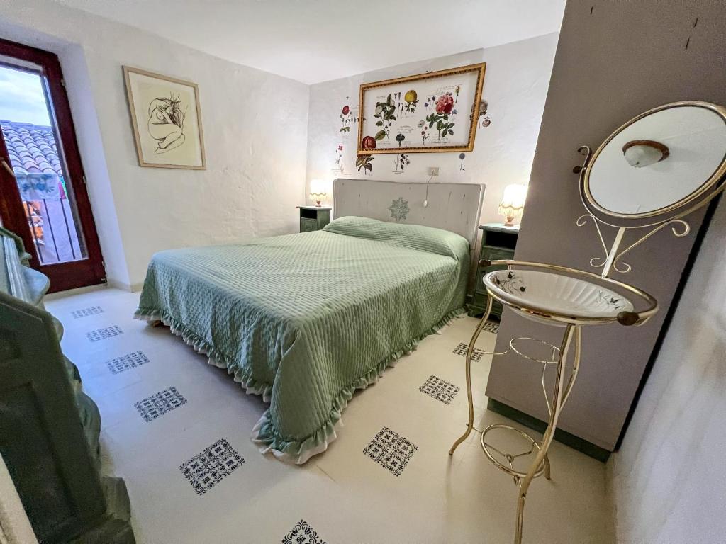 Postel nebo postele na pokoji v ubytování I Due Gradoni Stone House
