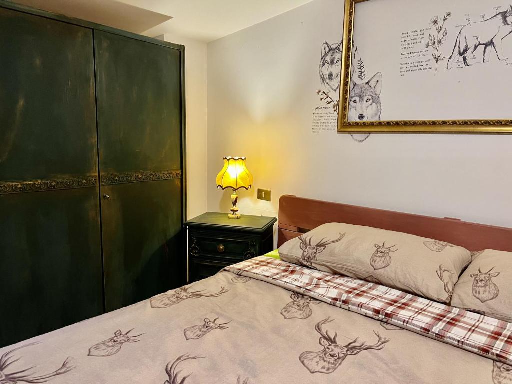 Postel nebo postele na pokoji v ubytování I Due Gradoni Stone House