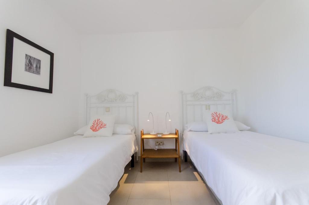 Postel nebo postele na pokoji v ubytování Vv - San Agustín Seaview Apartment