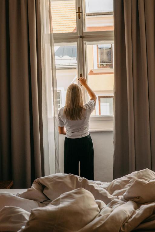 Postel nebo postele na pokoji v ubytování Hotel Palais26