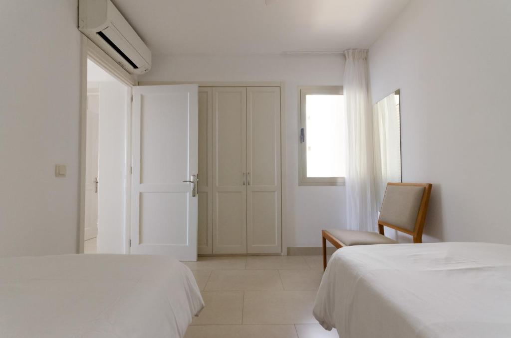 Postel nebo postele na pokoji v ubytování Vv - San Agustín Seaview Apartment