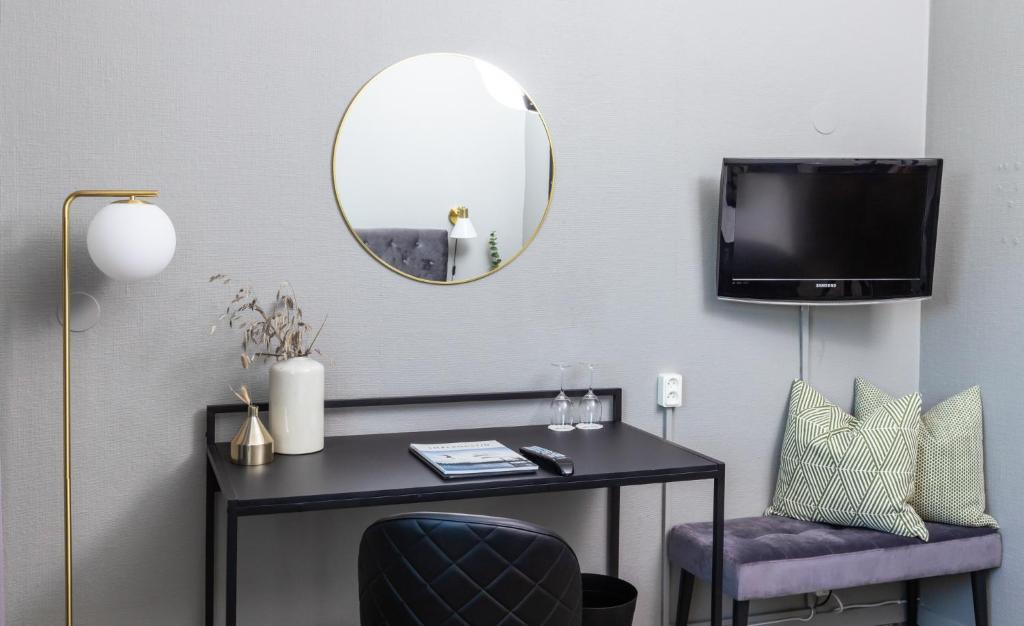 TV a/nebo společenská místnost v ubytování Stora Hotellet Markaryd