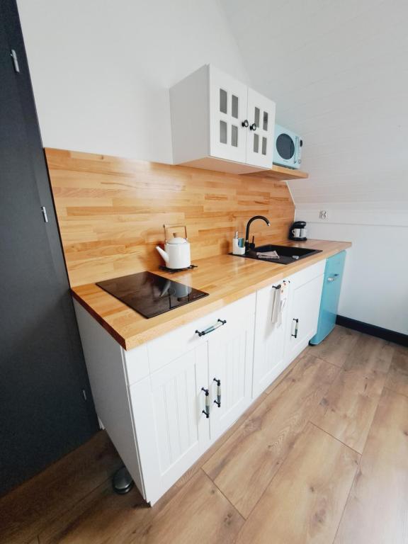 Kuchyňa alebo kuchynka v ubytovaní apartament BB