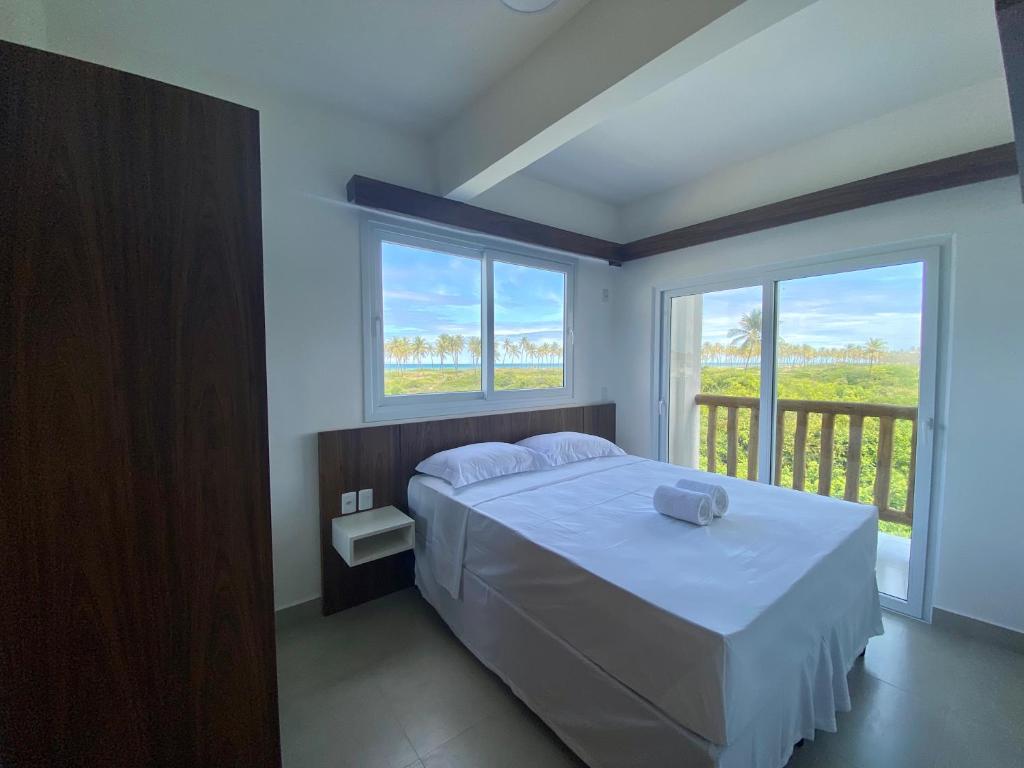 Postel nebo postele na pokoji v ubytování Tree Bies Resort - Oficial