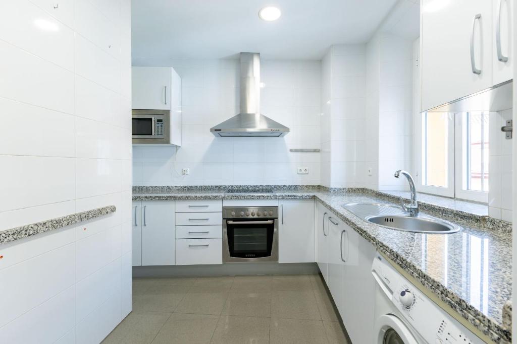Kuchyň nebo kuchyňský kout v ubytování Terceros City Center Deluxe by Valcambre
