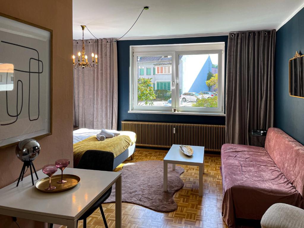 Posezení v ubytování Schickes Boutique-Apartment, zentral in Messe-& Bahnhofsnähe, sehr ruhig & gratis Parkplatz - HappyStay
