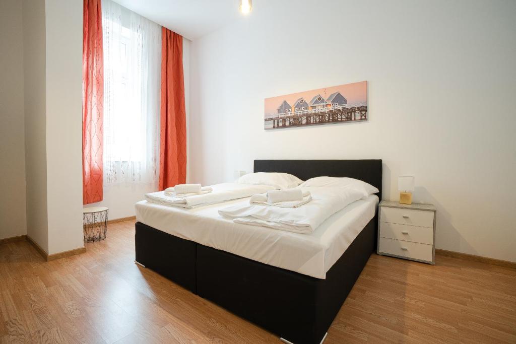 Posteľ alebo postele v izbe v ubytovaní Apartment in the central area. 5 minute's walk to the Danube.
